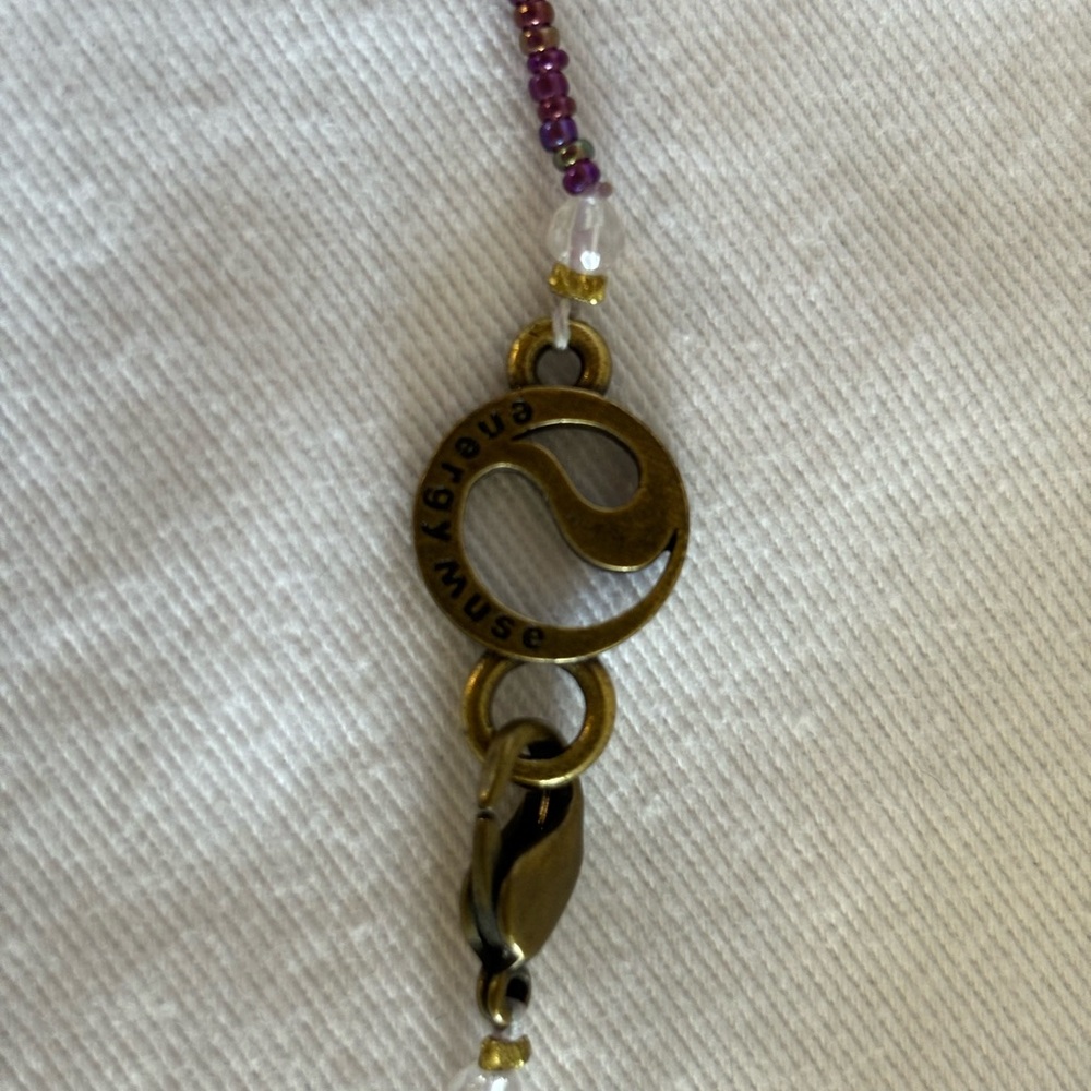 Energy Muse Brass Coin with Purple Beads, Thread and Pendant Stone - Picture 8 of 9